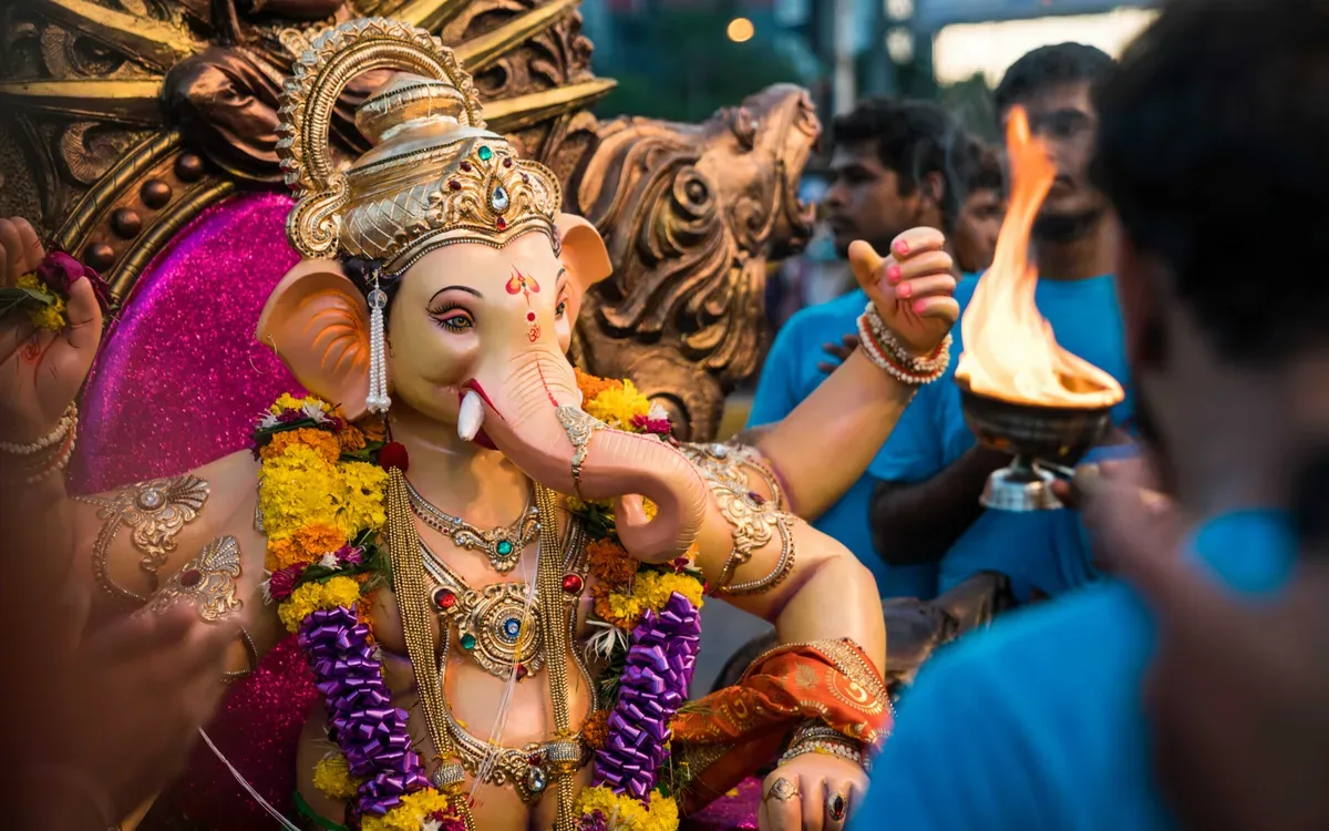 Stunning Ganesha idols, rhythmic chants, and heartfelt prayers fill the streets with festive energy.